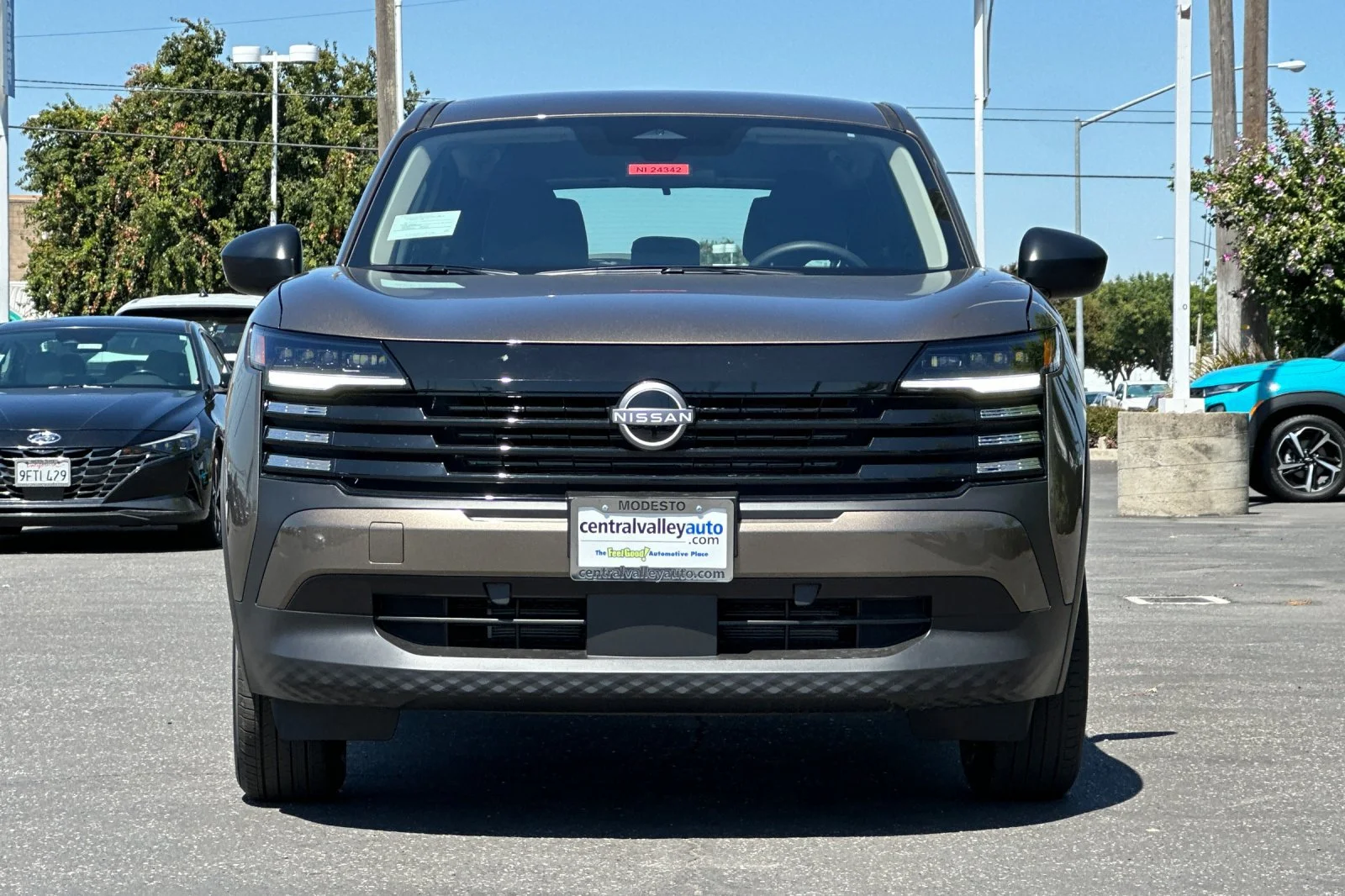 New 2026 Canyon Bronze Metallic Nissan S image 9