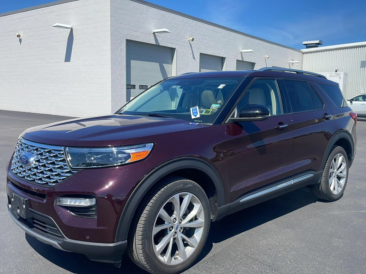 Used 2023 Jewel Red Metallic Tinted Clearcoat Ford Platinum image 6