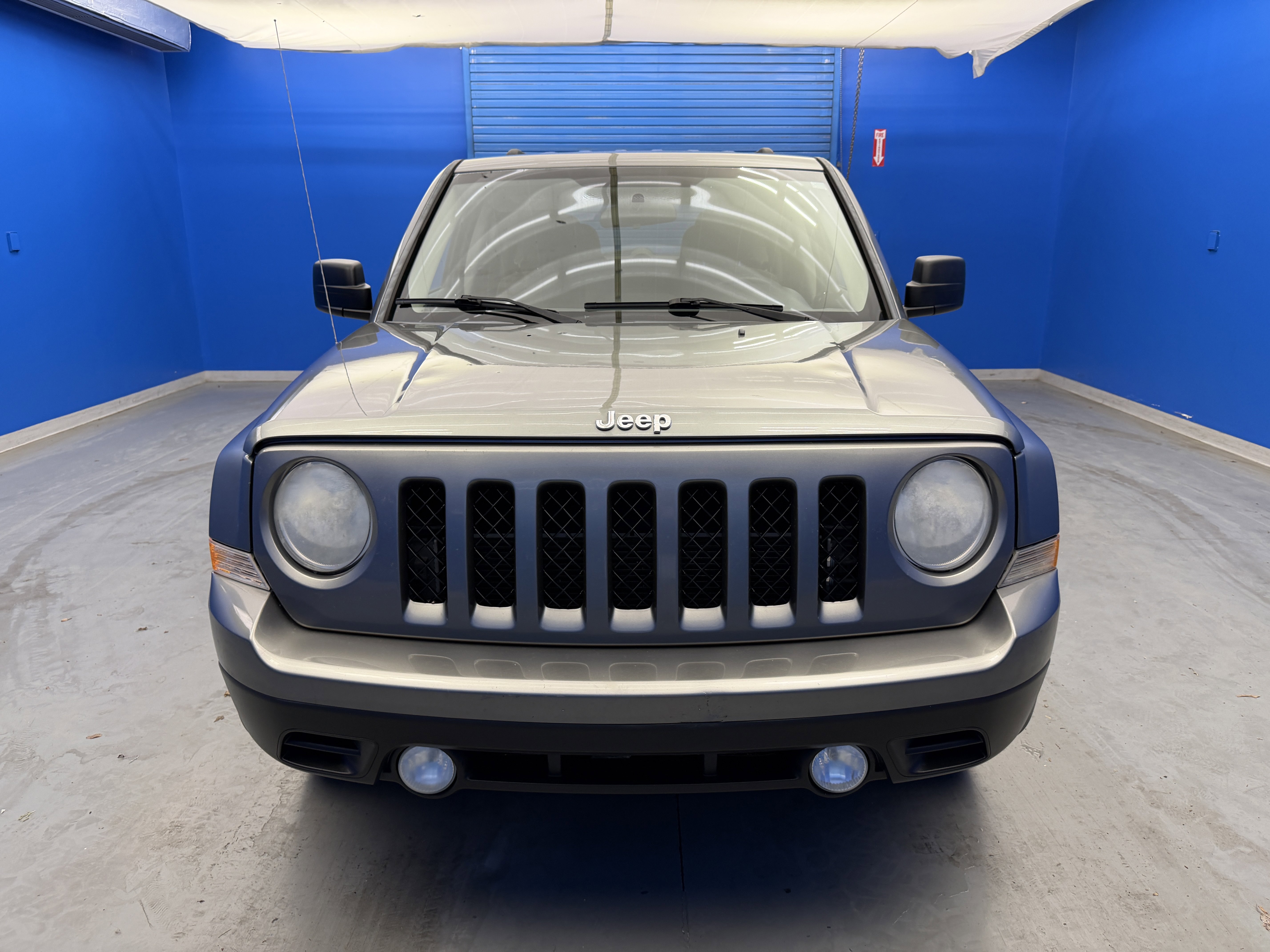 Used 2012 Mineral Gray Metallic Jeep Sport image 3
