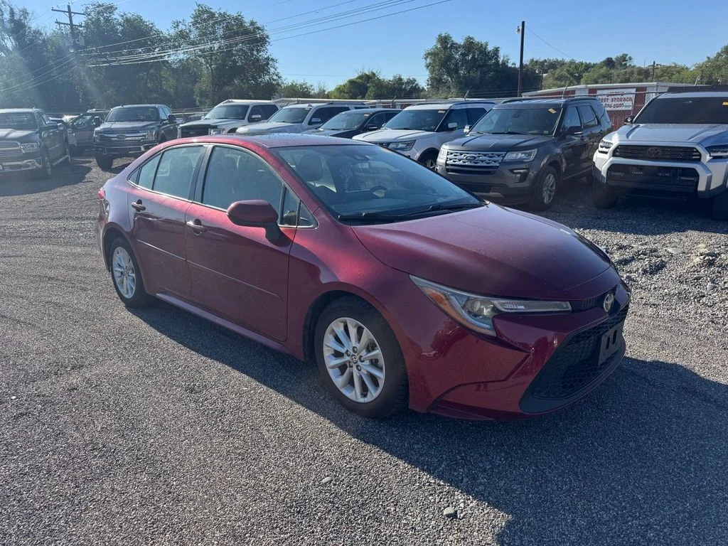 Used 2022 Pearl Toyota LE image 1