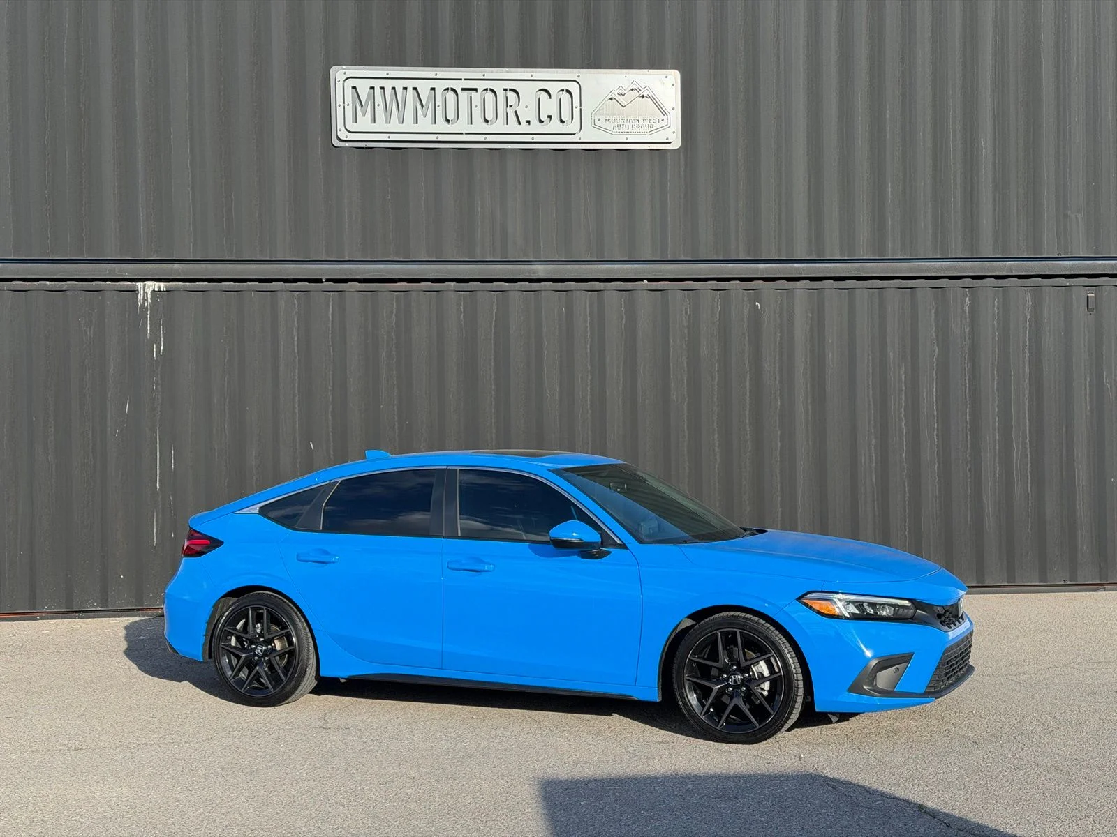 Used 2024 Blue Honda Sport Touring image 1