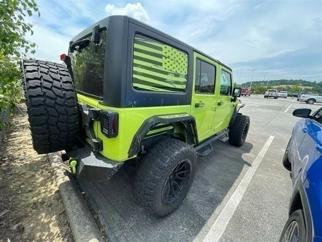 Used 2016 Green Jeep Unlimited Sahara image 6