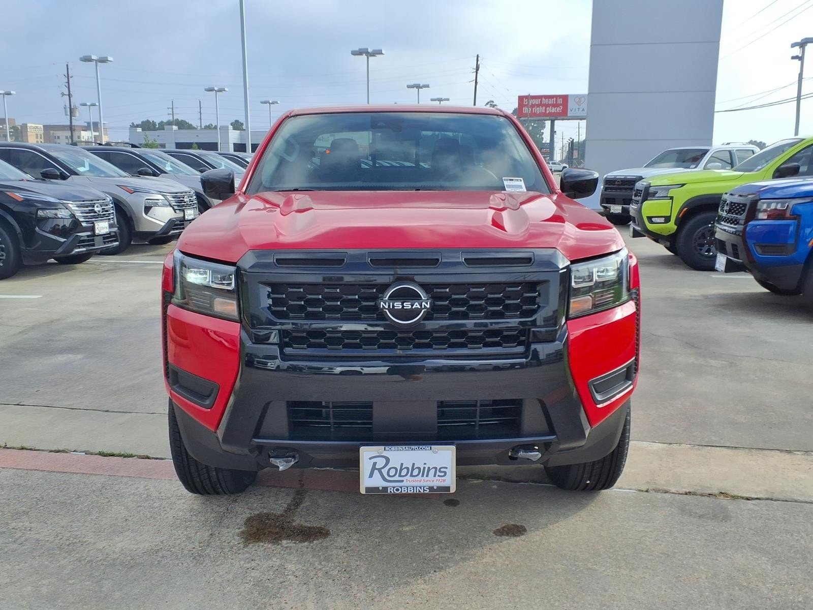 2026 Nissan Frontier SV Red at Robbins Nissan
