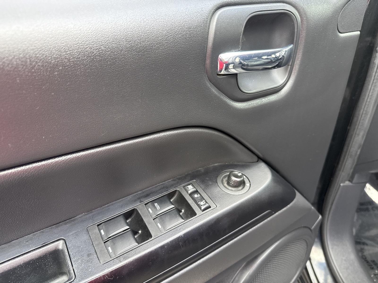 Used 2016 Black Clearcoat Jeep High Altitude Edition image 12