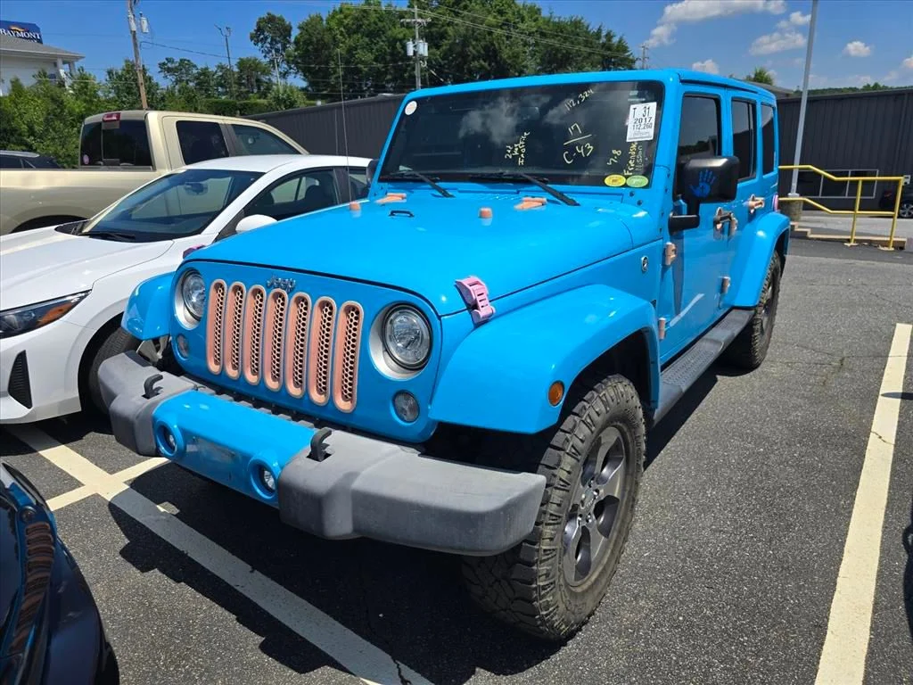 Used 2017 Blue Jeep Unlimited Sahara image 2