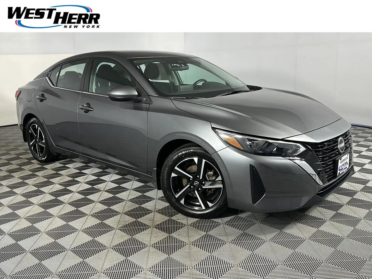 Used 2024 Gun Metallic Nissan SV image 1
