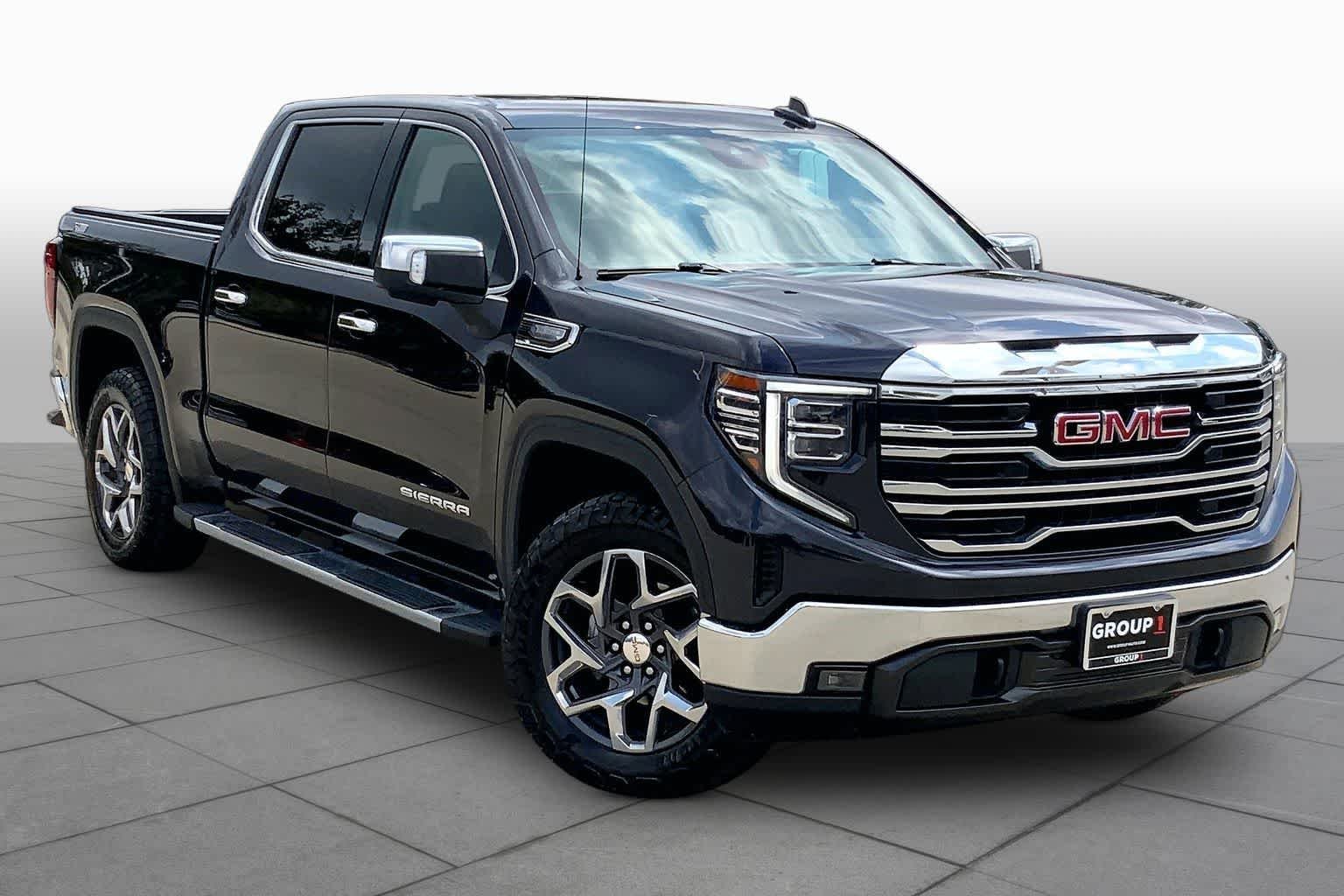Used 2023 Titanium Rush Metallic GMC SLT image 3