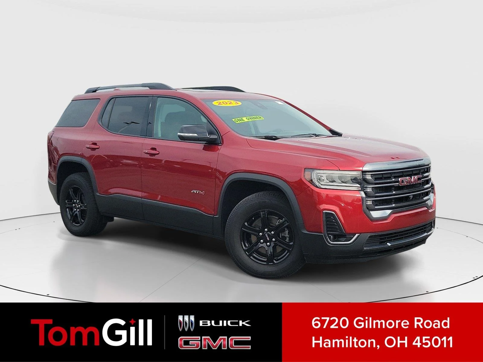 Used 2023 VOLCANIC RED TINTCOAT GMC AT4 image 1