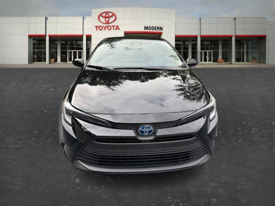 Used 2024 Midnight Black Metallic Toyota Hybrid LE image 2