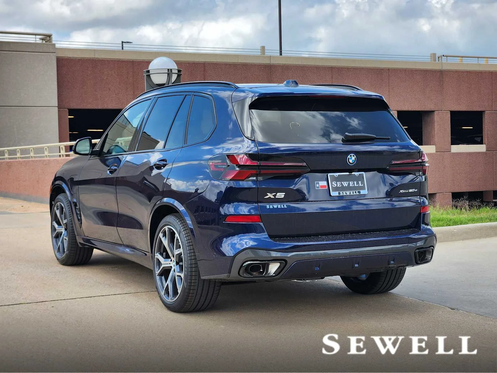 New 2026 Tanzanite Blue II Metallic BMW xDrive50e image 3