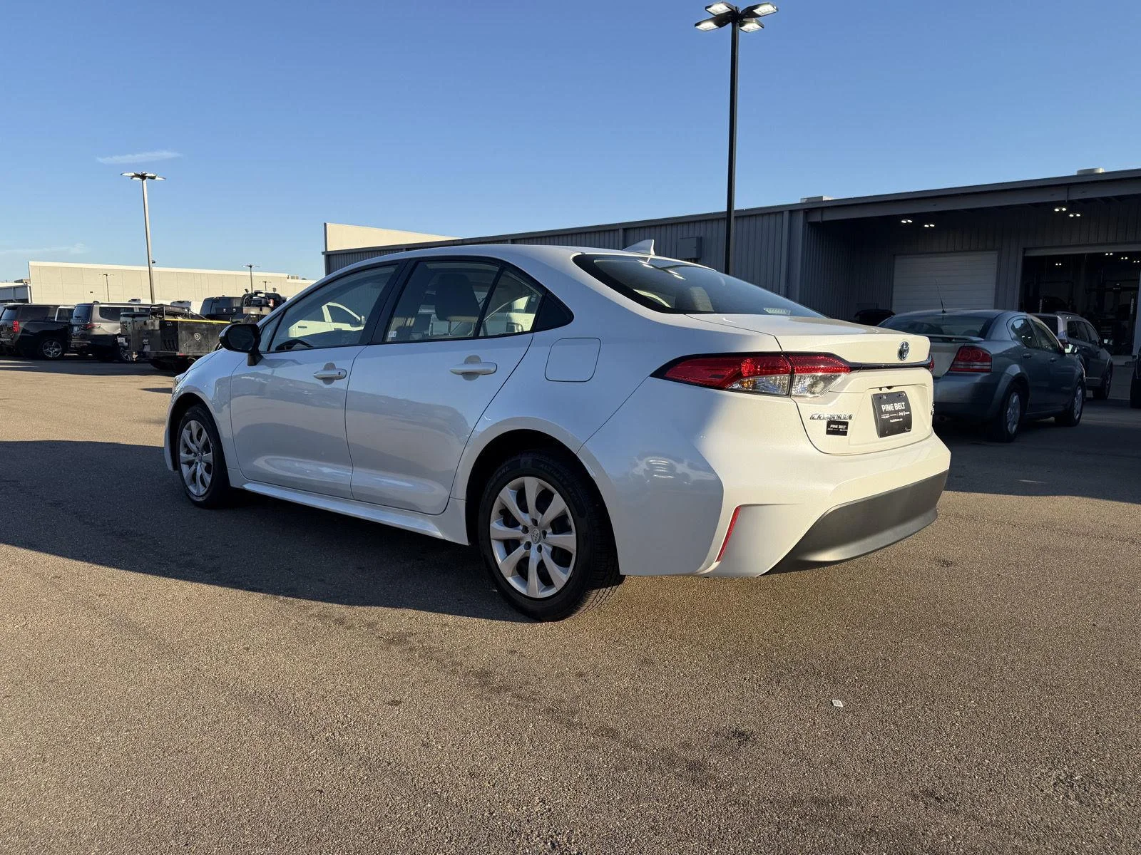 Used 2024 Wind Chill Pearl Toyota Hybrid LE image 4