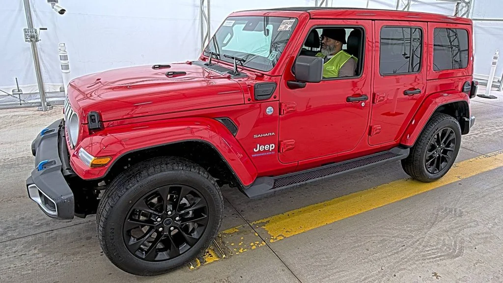 Used 2024 Red Jeep Sahara 4xe image 1