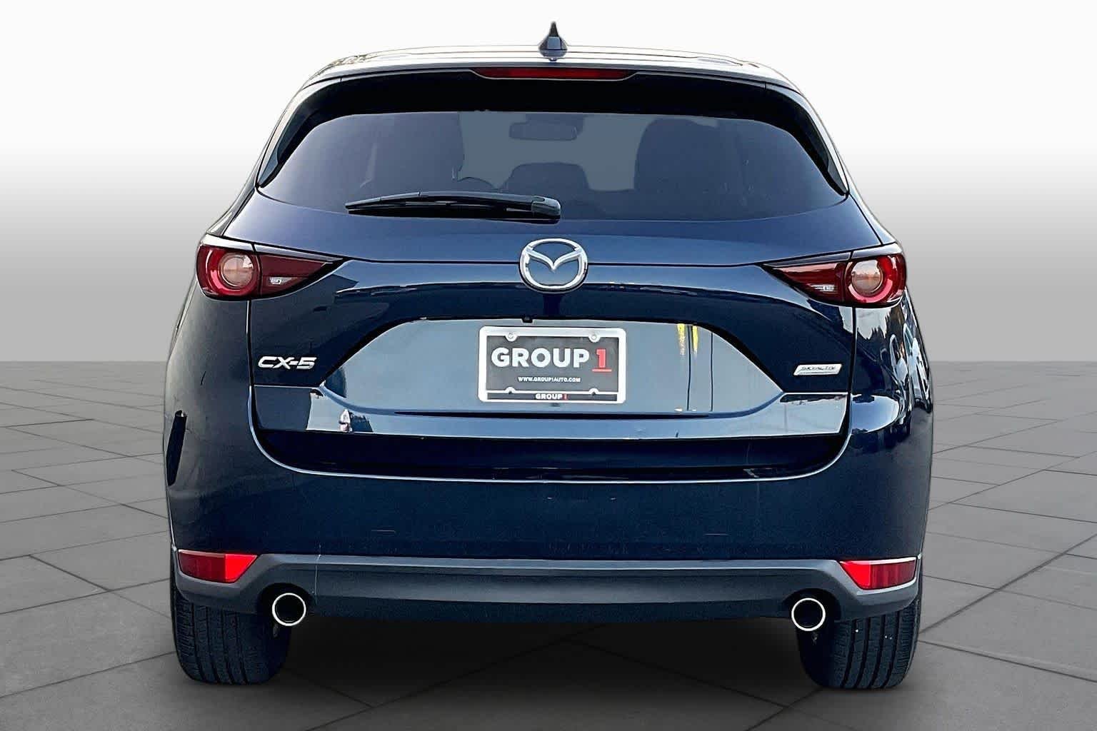 Used 2019 Deep Crystal Blue Mica Mazda Touring image 4