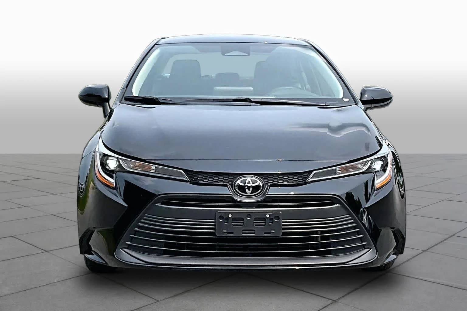 Used 2024 Midnight Black Metallic Toyota LE image 4