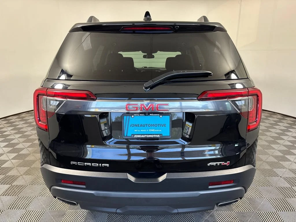 Used 2023 EBONY TWILIGHT METALLIC GMC AT4 image 10