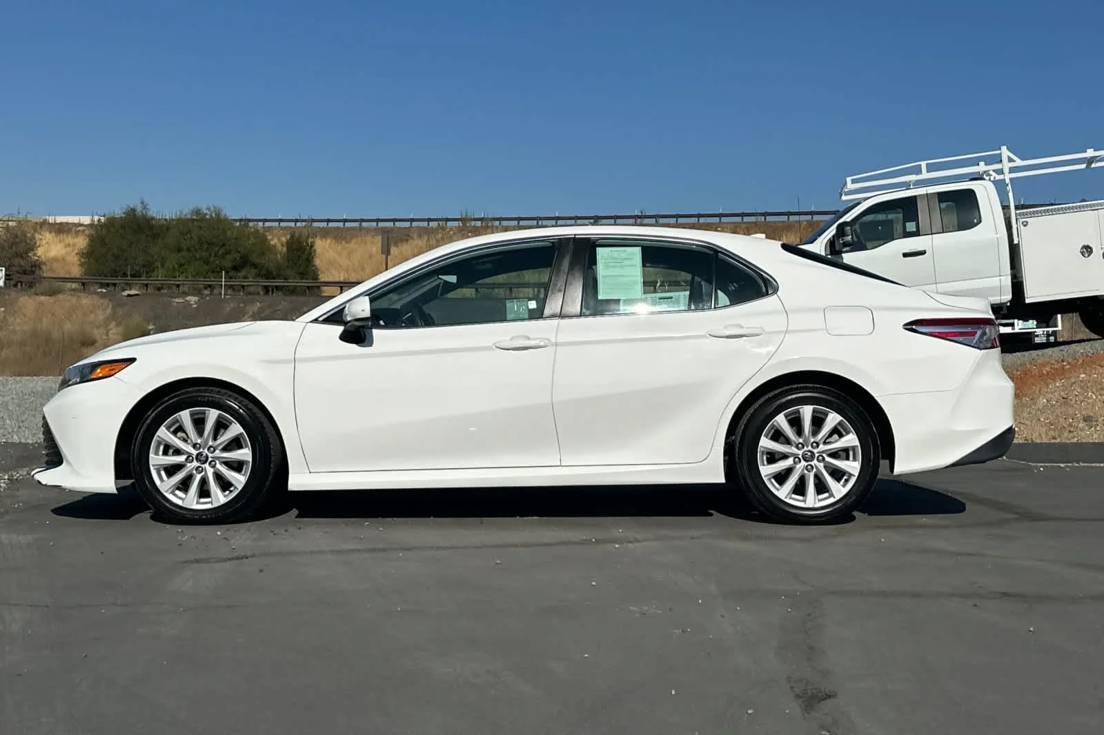 Used 2020 Super White Toyota LE image 7