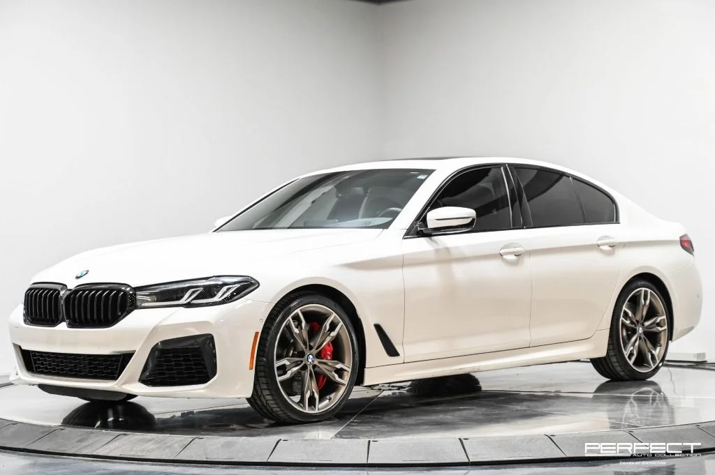 Used 2020 White BMW M550i xDrive image 1