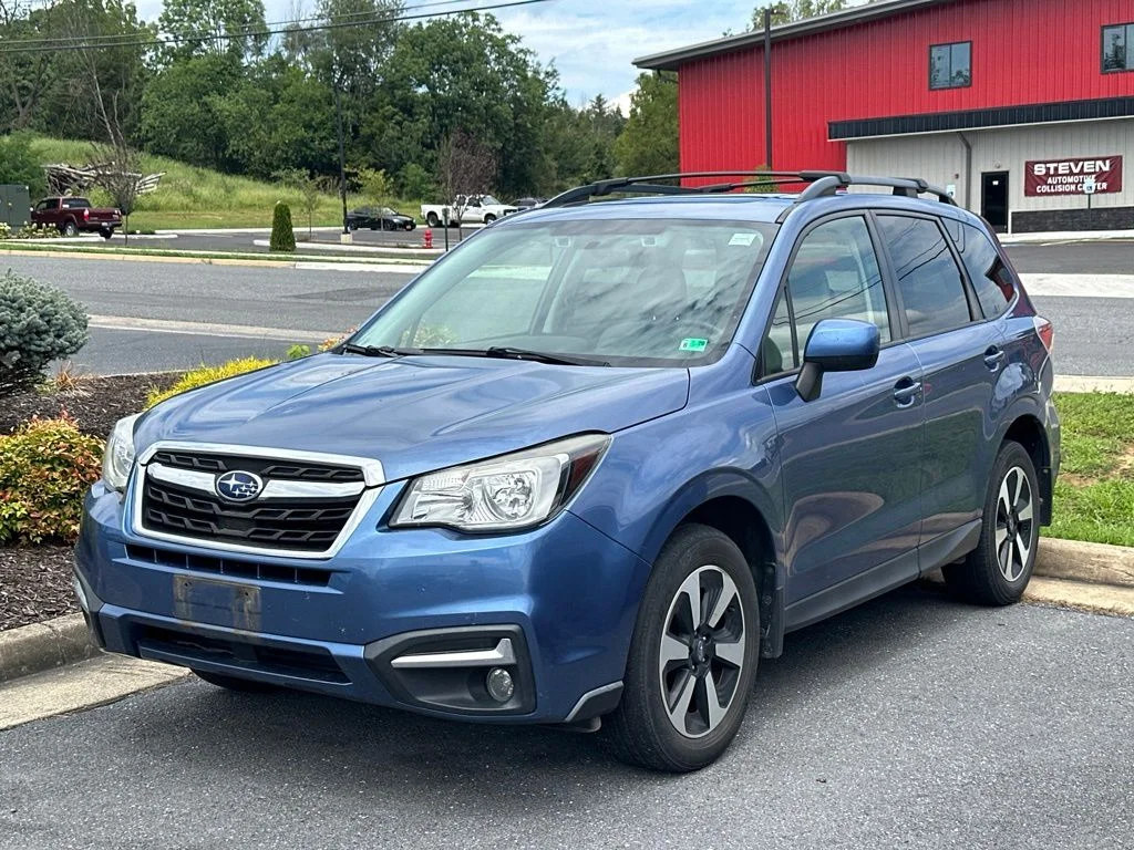 Used 2017 Quartz Blue Subaru 2.5i Premium image 1