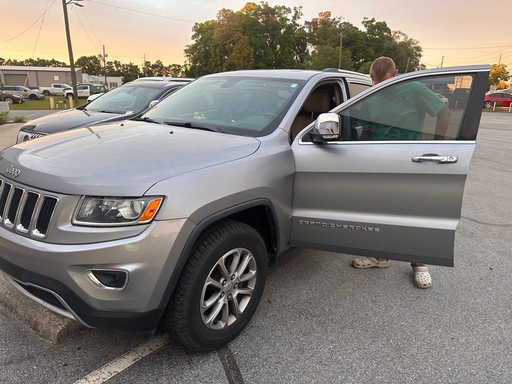 Used 2014 Jeep Grand Cherokee Limited with VIN 1C4RJEBGXEC239802 for sale in Milton, FL