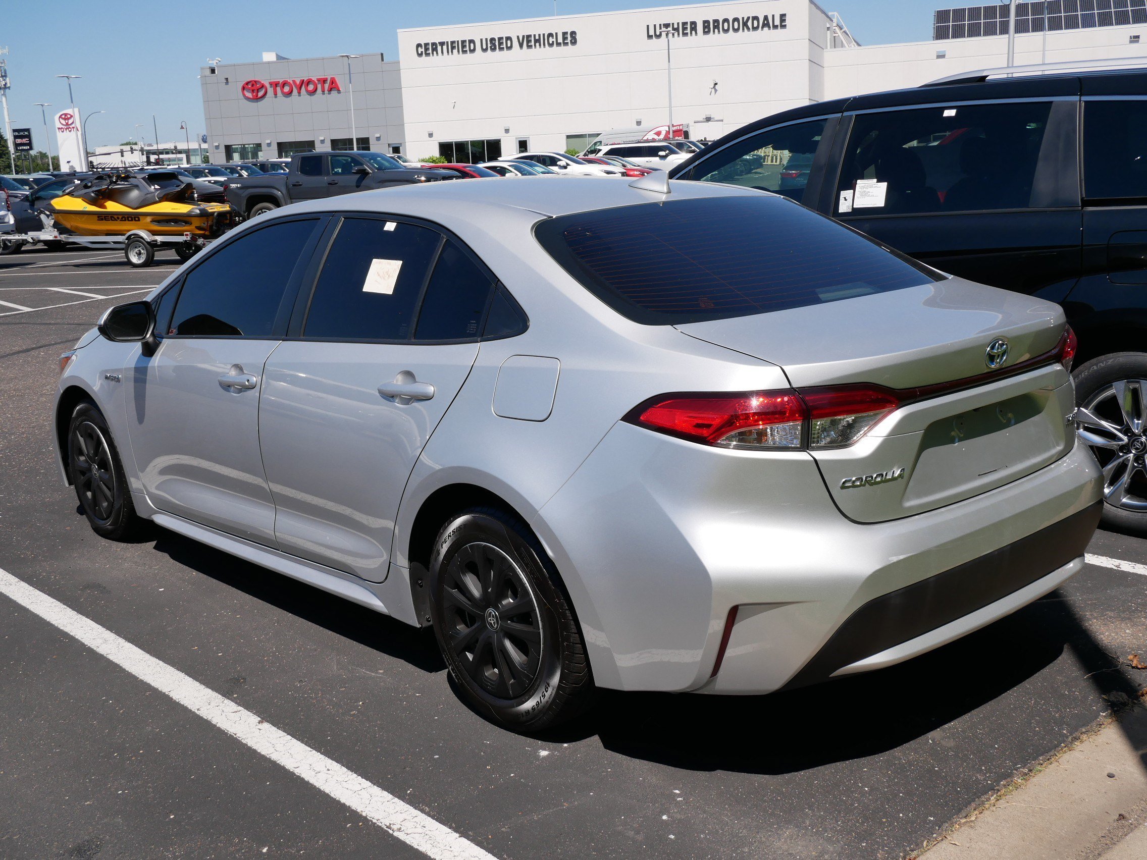 Certified Used 2021 CLASSIC SILVER MET Toyota Hybrid LE image 4