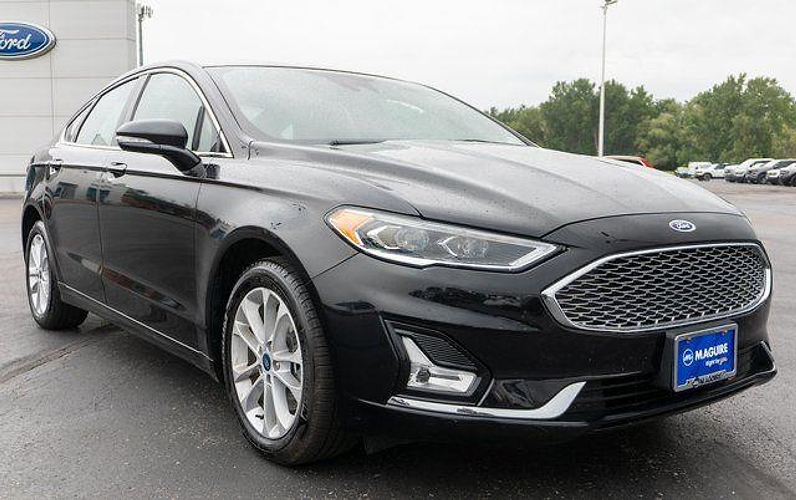 Used 2020 Agate Black Metallic Ford Plug-In Hybrid Titanium image 4
