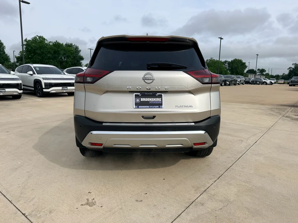 Used 2023 Champagne Silver Metallic Nissan Platinum image 7