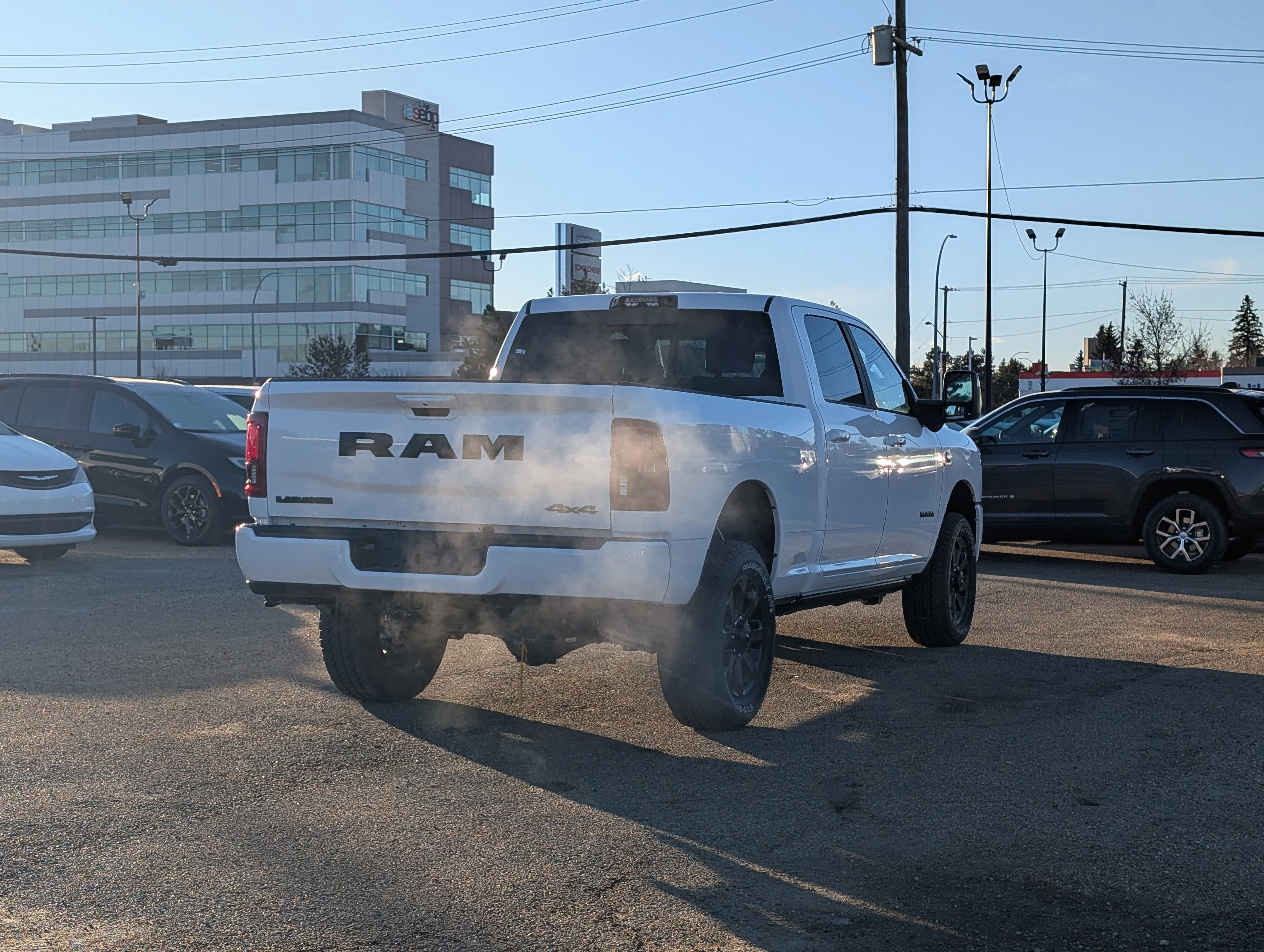 New 2026 Bright White Ram Laramie image 7