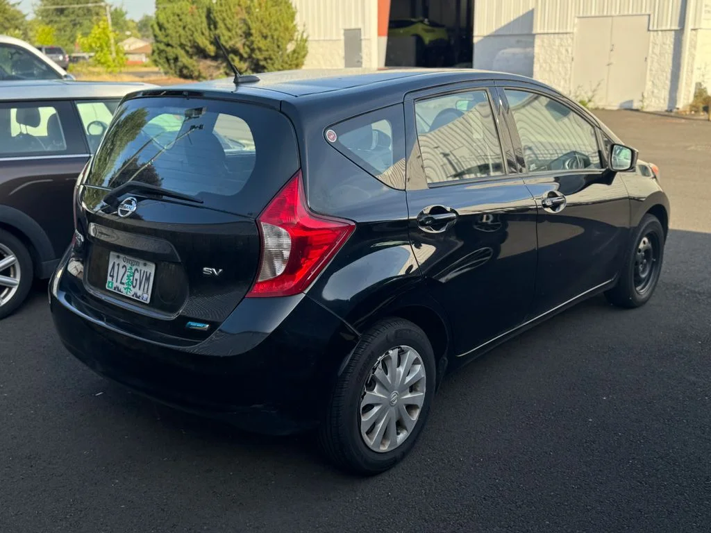 Used 2015 Super Black Nissan SV image 2