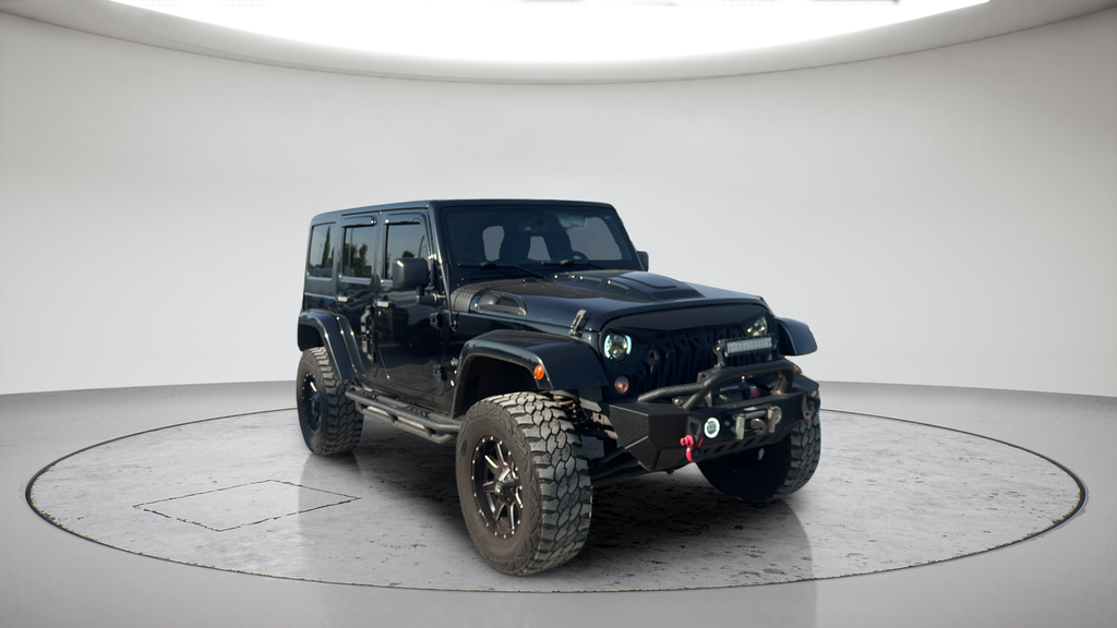 Used 2015 Black Jeep Unlimited Sahara image 1
