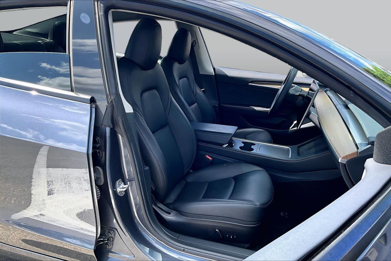 Used 2023 Solid Black Tesla  image 7