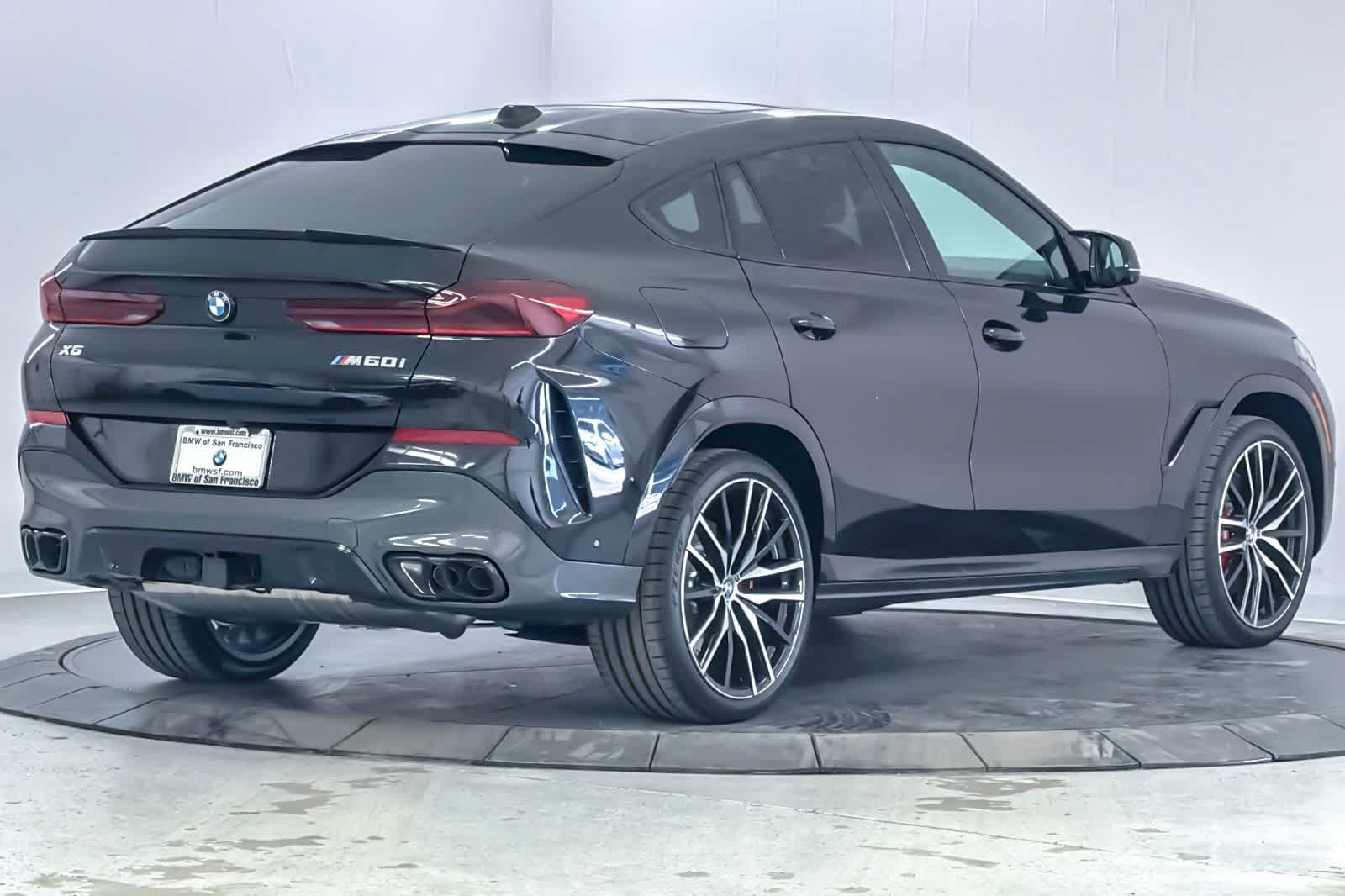 New 2026 Black Sapphire Metallic BMW M60i image 2