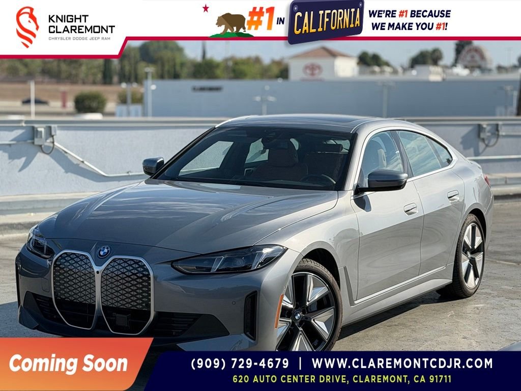 Used 2025 Gray Metallic BMW eDrive40 image 1