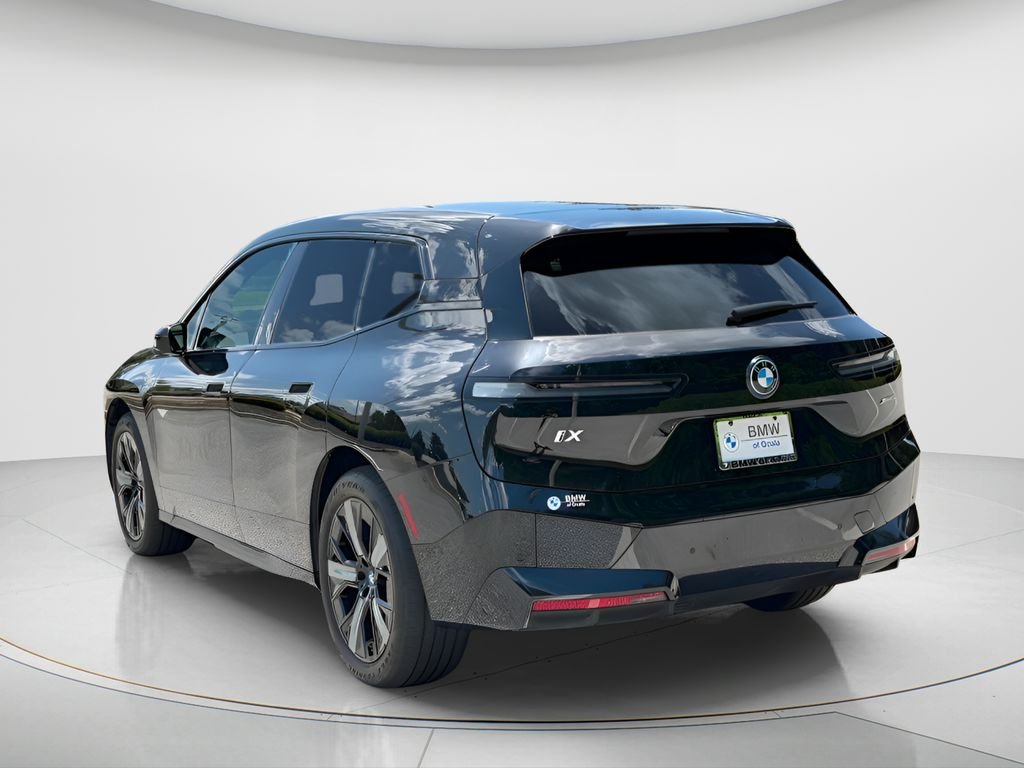Used 2024 Black BMW xDrive50 image 7
