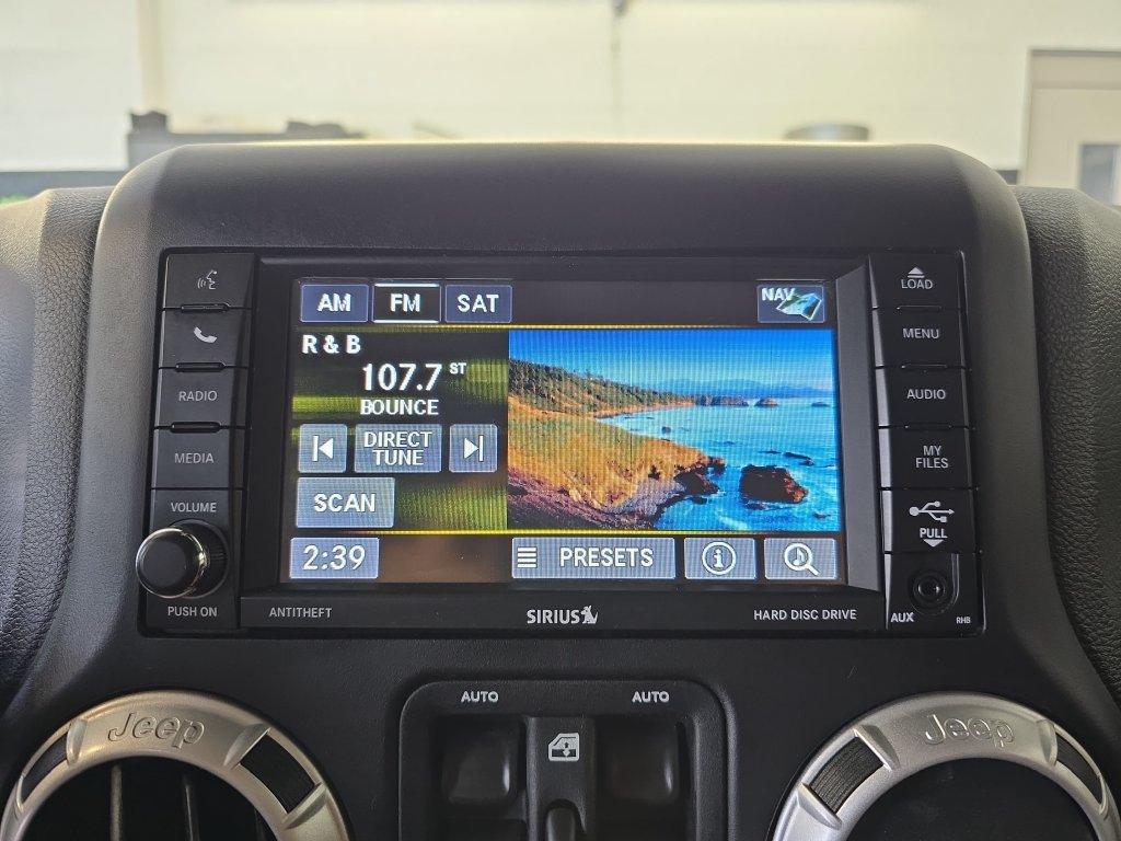 Used 2016 Silver Jeep Unlimited Sahara image 23