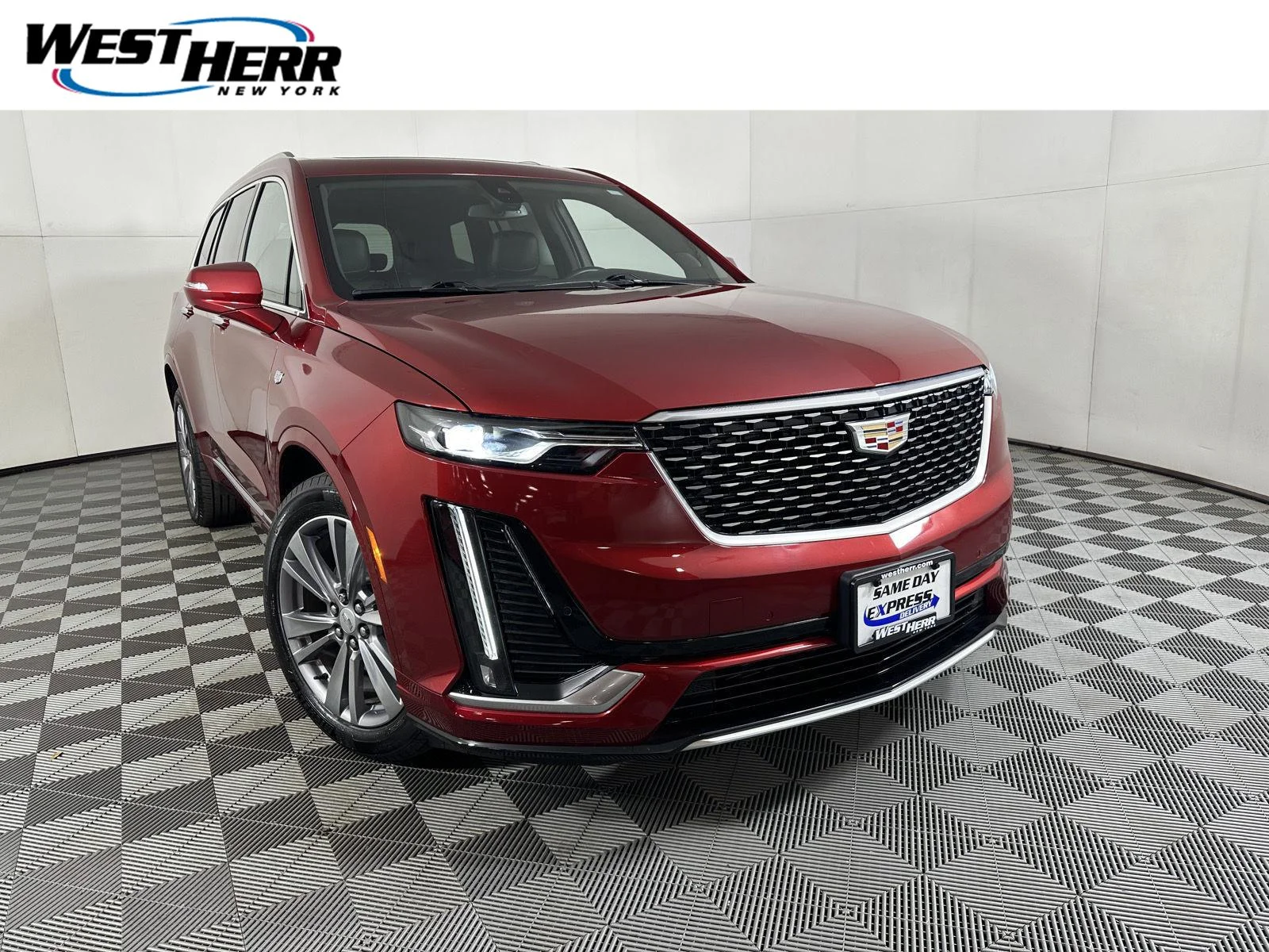 Used 2024 Radiant Red Tintcoat Cadillac AWD Premium Luxury image 1
