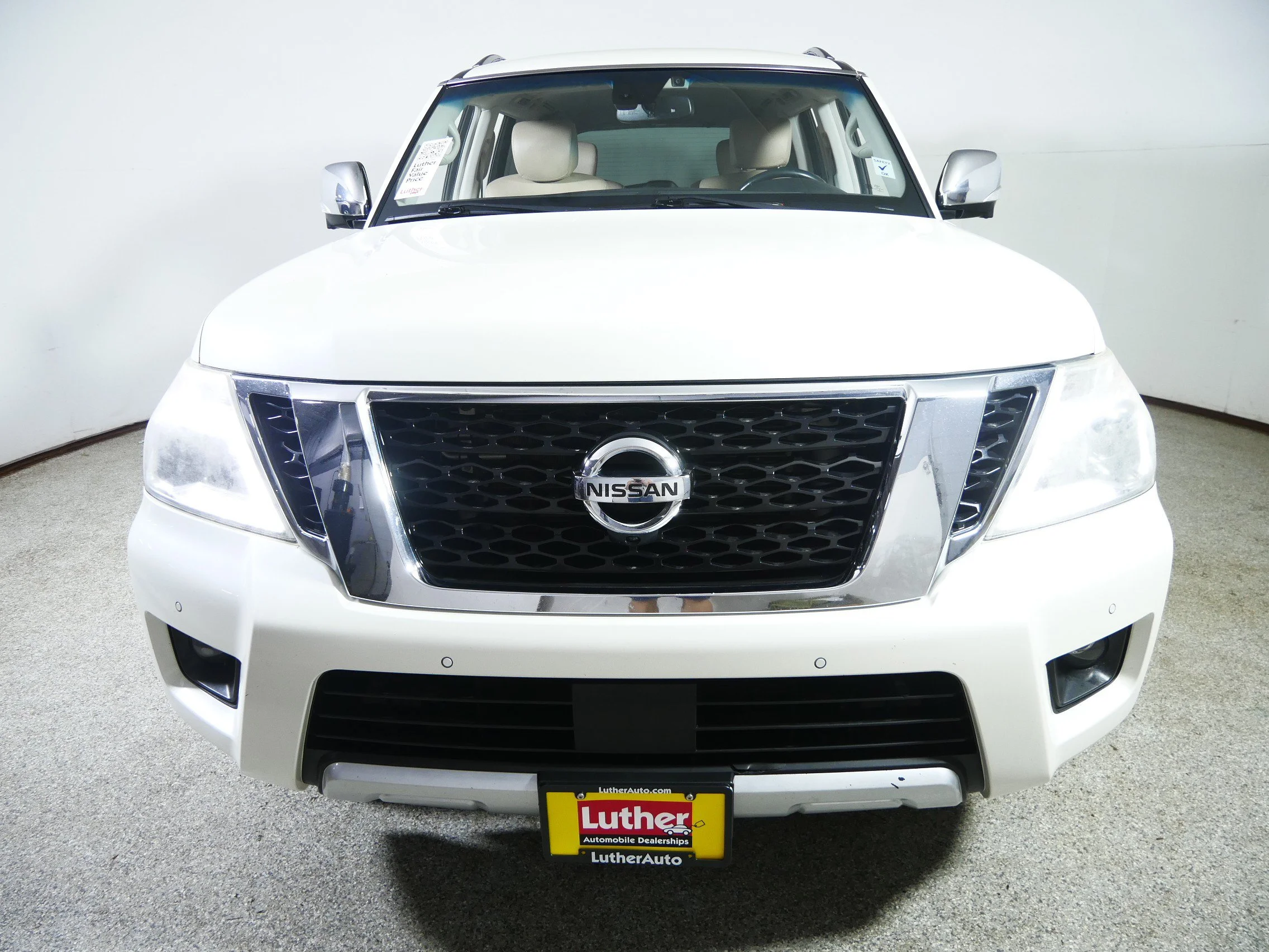Used 2017 Pearl White Nissan Platinum image 2