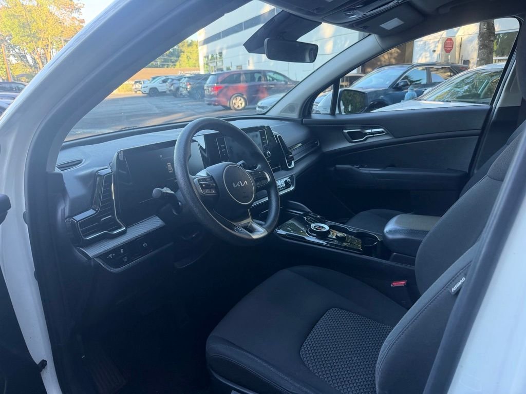 Used 2023 Snow White Pearl Kia LX image 10