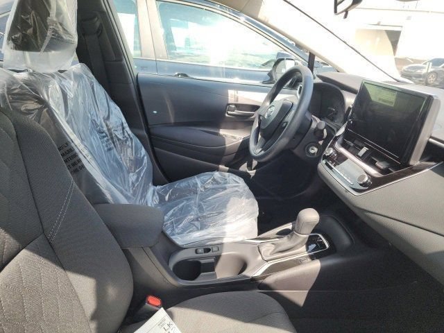 Used 2025 Midnight Black Metallic Toyota LE image 11