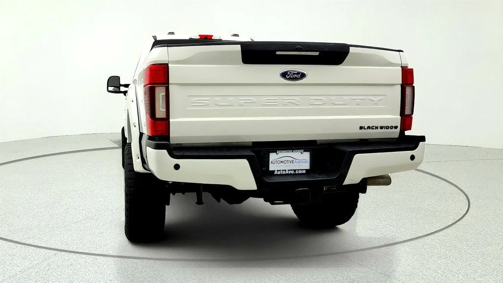 Used 2022 Star White Metallic Tri-Coat Ford Black Widow LARIAT 4WD Crew Cab 6.75