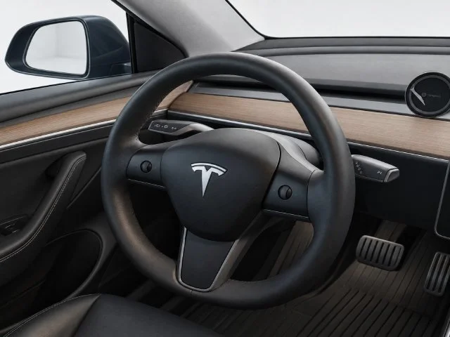 Used 2023 Solid Black Tesla Performance image 17