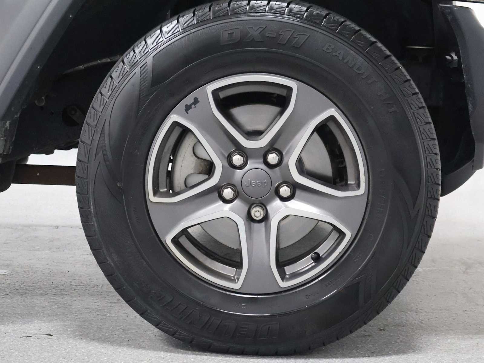 Used 2018 Granite Crystal Metallic Clearcoat Jeep Sport S image 12