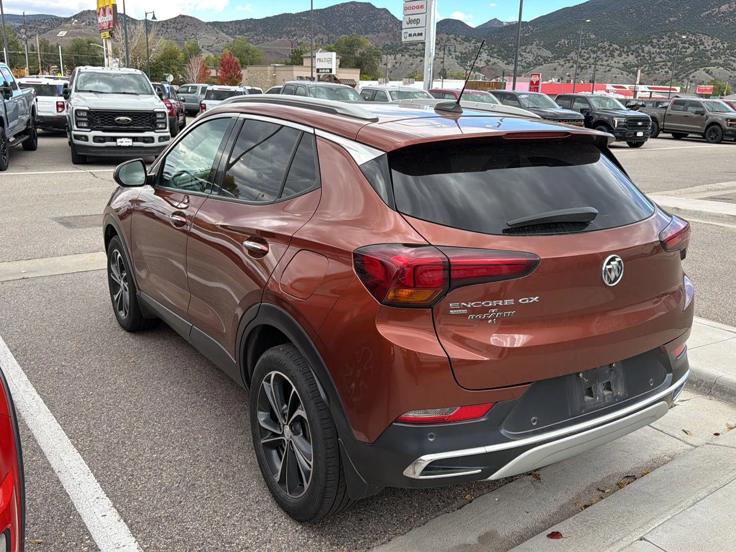Used 2021 BURNISHED BRONZE METALLIC Buick Essence image 4