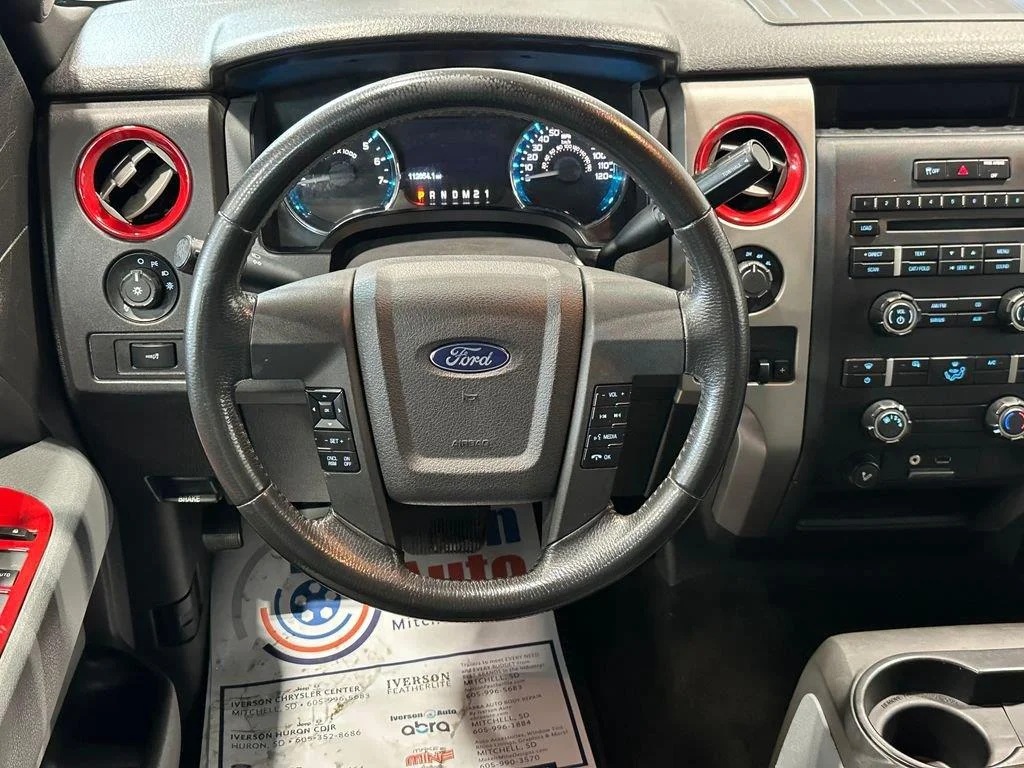 Used 2012 Race Red FORD 4WD SUPERCREW 145