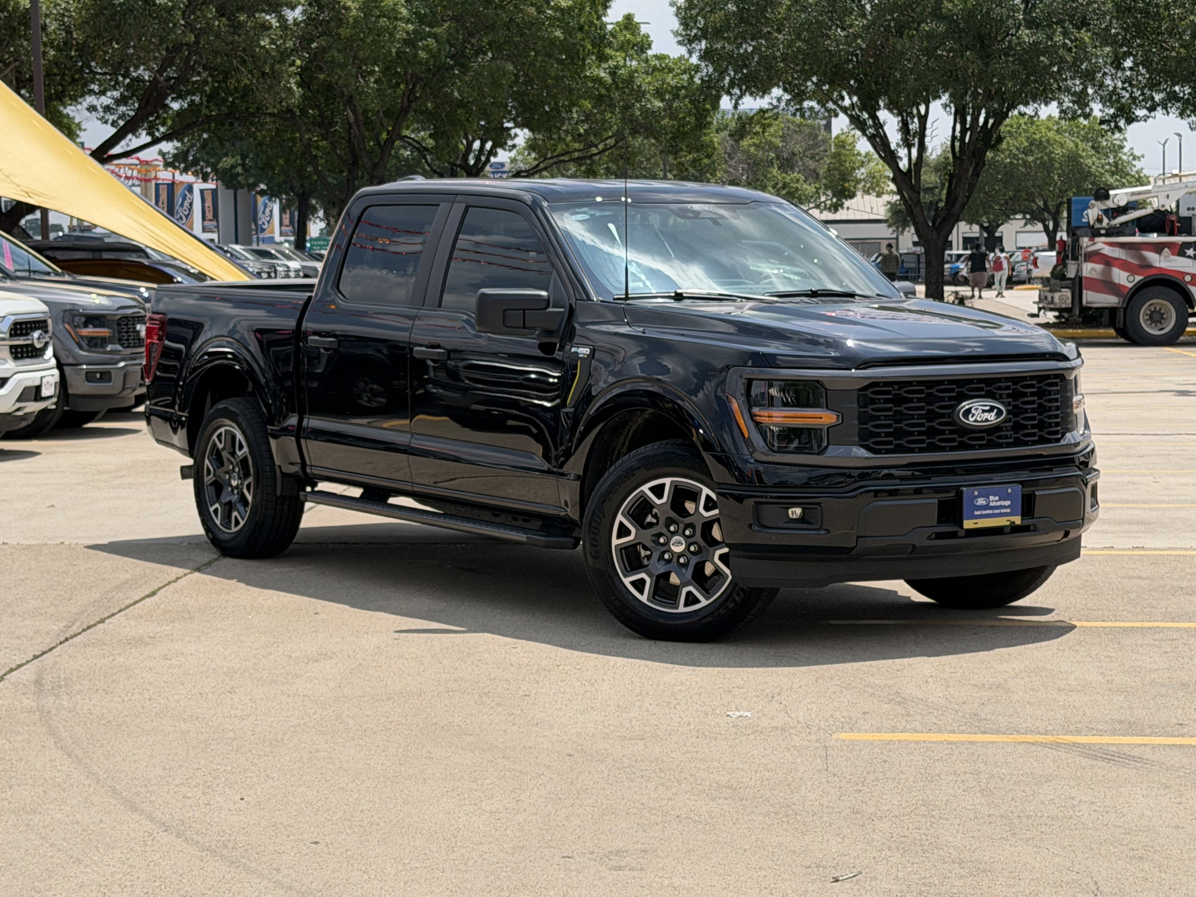 Used 2024 Agate Black Metallic Ford STX image 1