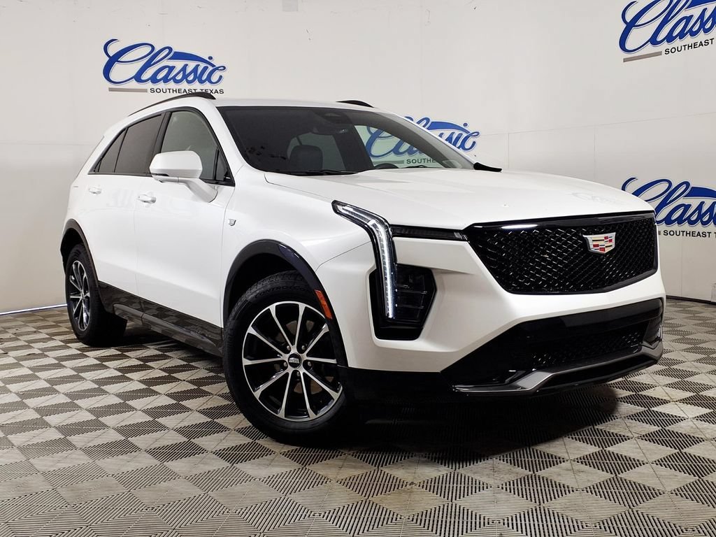 Used 2025 Crystal White Tricoat Cadillac Sport image 1