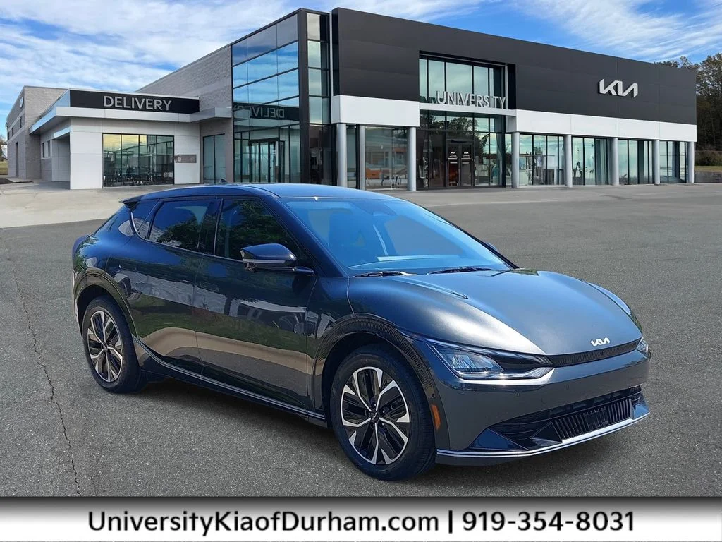 Used 2023 Gray Kia Wind image 1