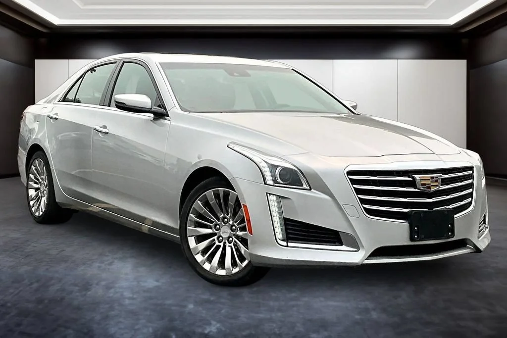 Used 2018 RADIANT SILVER METALLIC Cadillac Luxury AWD image 1