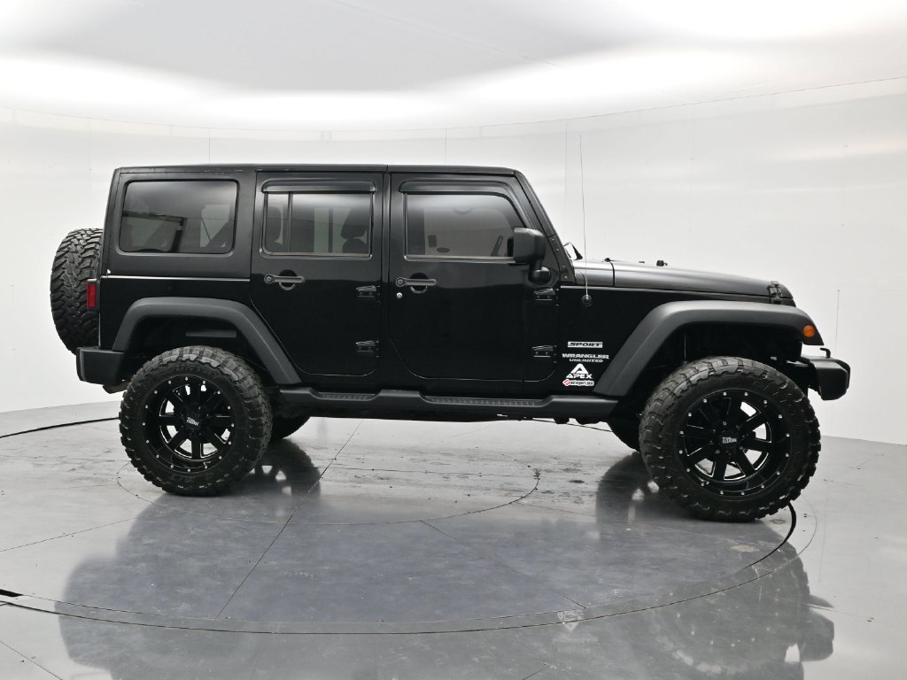 Used 2014 Black Clearcoat Jeep Unlimited Sport image 4