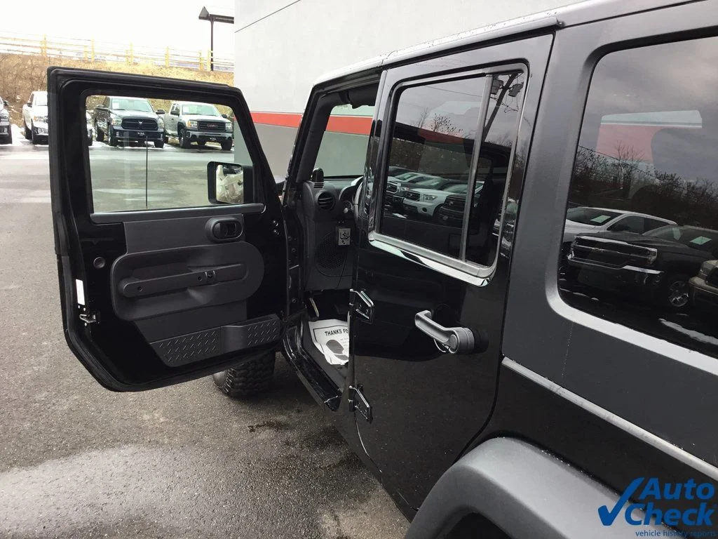Used 2010 Black Jeep Unlimited Sport image 33