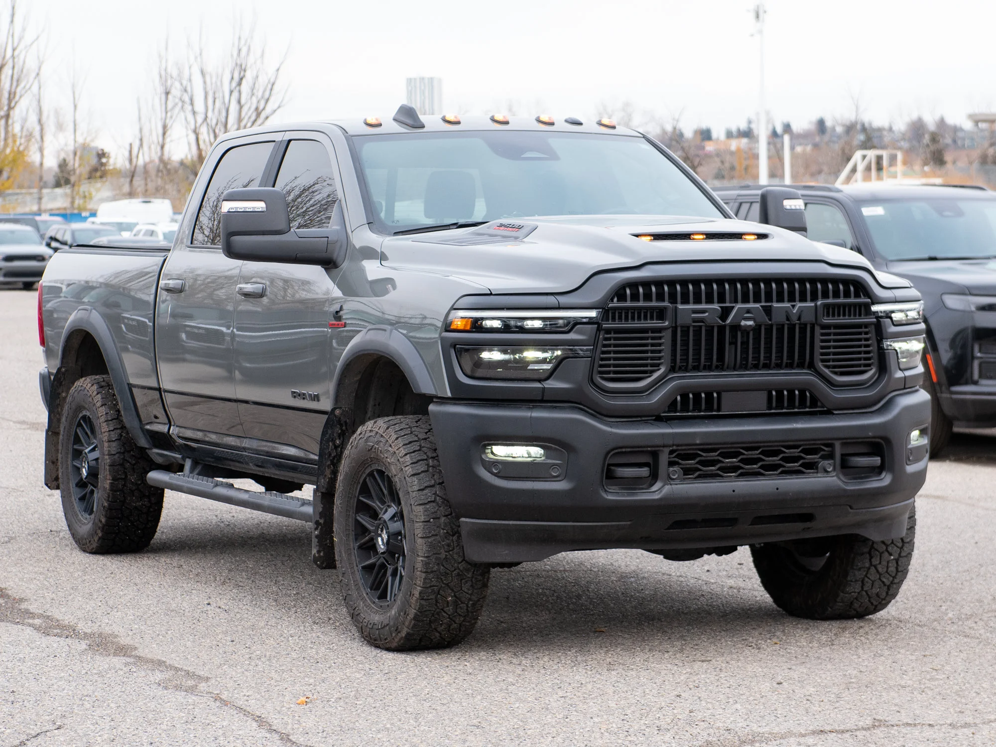 Used 2026 Grey RAM Rebel* Crew Cab 4x4, 2 Inch Lift, 35 Inch Tires, Winch, Trigger Industries MudFlaps image 8